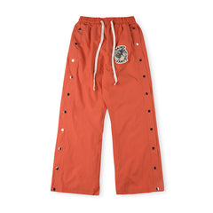 SAINT VANITY Nylon Hooded Track Pants “Orange”