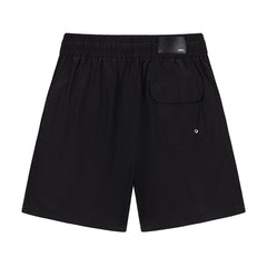 AMIRI Starburst logo shell swim shorts