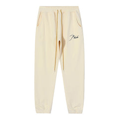 RHUDE embroidered slogan logo sweatpants