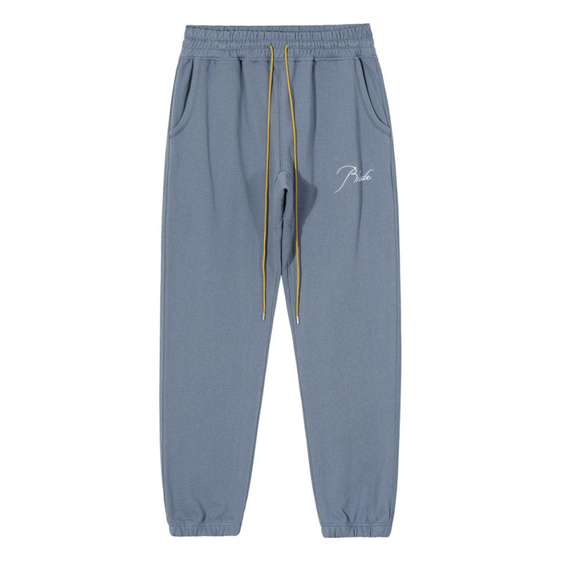 RHUDE embroidered slogan logo sweatpants