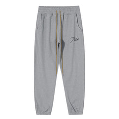 RHUDE embroidered slogan logo sweatpants