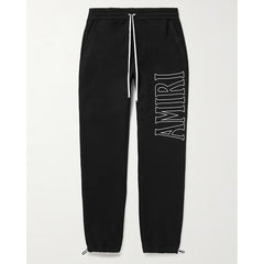 AMIRI Zoltar Tapered Logo-Print Cotton-Jersey Sweatpants